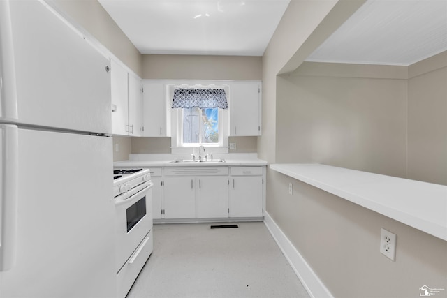 934 Smith St, Monroe, MI 48161 - kitchen featuring white appliances, baseboards, light countertops, white cabinetry, and a sink