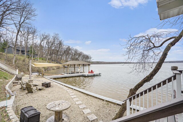 dock area with a water view