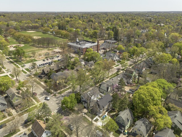 bird's eye view featuring a residential view and a forest view