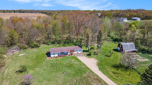 bird's eye view with a forest view