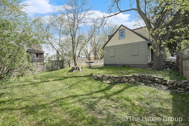 view of yard featuring a fenced backyard