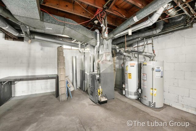 unfinished below grade area with heating unit and gas water heater