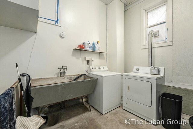 laundry area featuring laundry area and washing machine and dryer