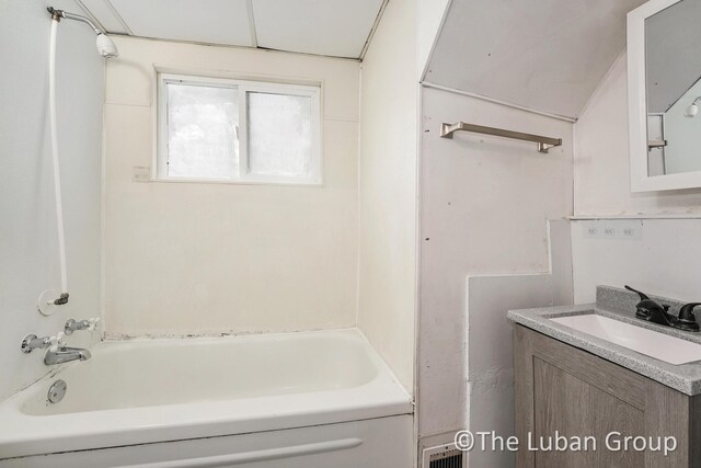 bathroom with shower / bathtub combination and vanity