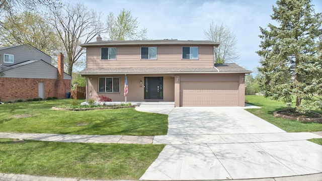 1901 Woodgate Dr, Troy, MI 48083 - traditional home with a porch, a chimney, driveway, and a front yard