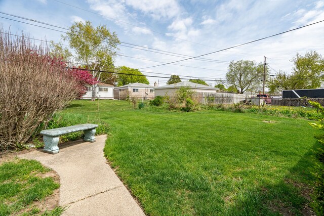 view of yard with fence
