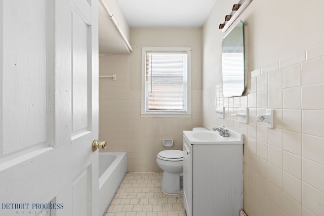 18626 Prevost St, Detroit, MI 48235 - full bath featuring tile patterned flooring, vanity, a bathing tub, toilet, and tile walls
