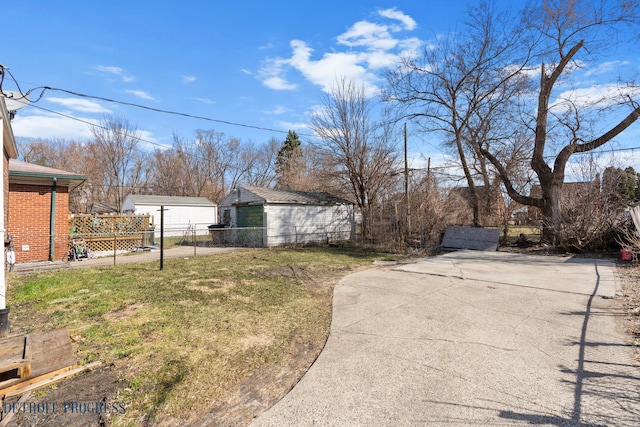 18626 Prevost St, Detroit, MI 48235 - view of yard with an outdoor structure and fence