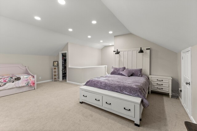 bedroom with light colored carpet, recessed lighting, baseboards, and vaulted ceiling