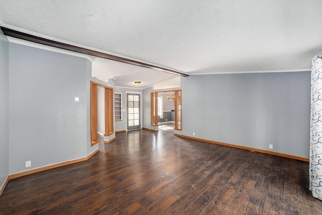 5355 W Remus Rd, Mount Pleasant, MI 48858 - unfurnished living room with baseboards, ornamental molding, a textured ceiling, and wood finished floors