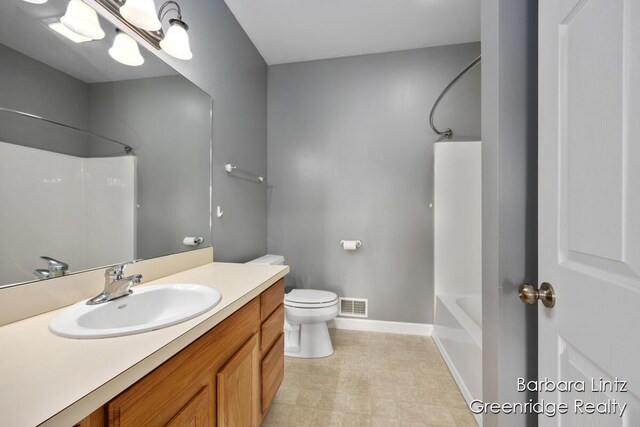 full bathroom with visible vents, shower / tub combination, vanity, baseboards, and toilet