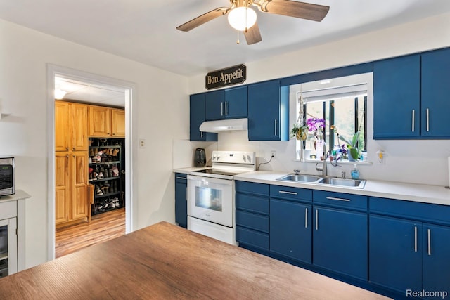 5304 E Frances Rd, Mount Morris, MI 48458 - kitchen featuring electric range and blue cabinetry