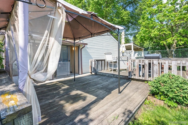 5304 E Frances Rd, Mount Morris, MI 48458 - wooden deck featuring a gazebo and grilling area
