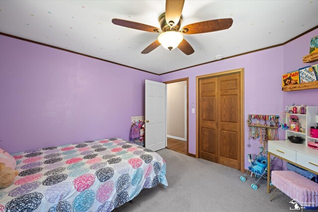 bedroom with ornamental molding, carpet, and ceiling fan