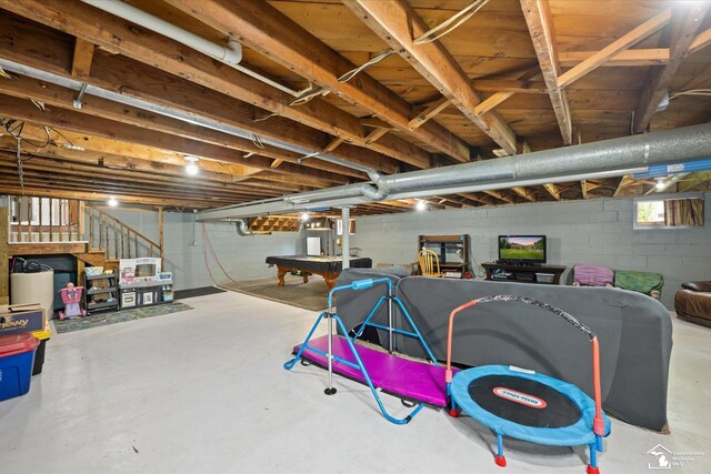 basement with stairway and billiards