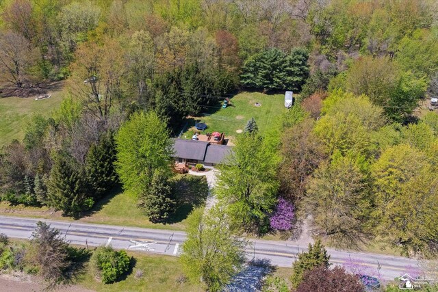 aerial view featuring a view of trees