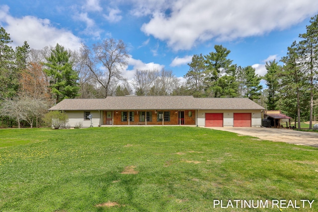 4334 Brunswick Rd, Holton, MI 49425 - ranch-style house with an attached garage, a front yard, driveway, and a porch