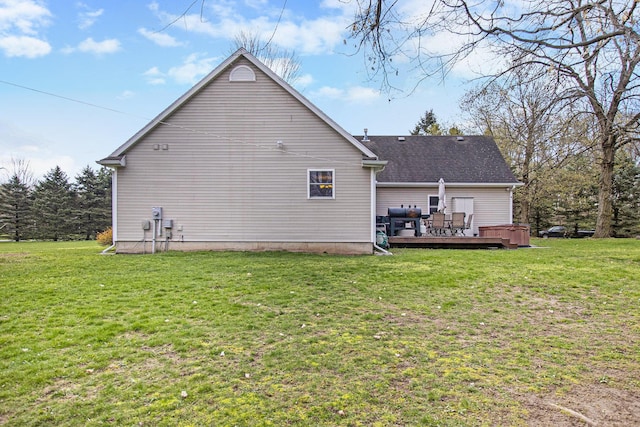 24260 Beacon Hill Ter, Mattawan, MI 49071 - back of house featuring a lawn and a wooden deck