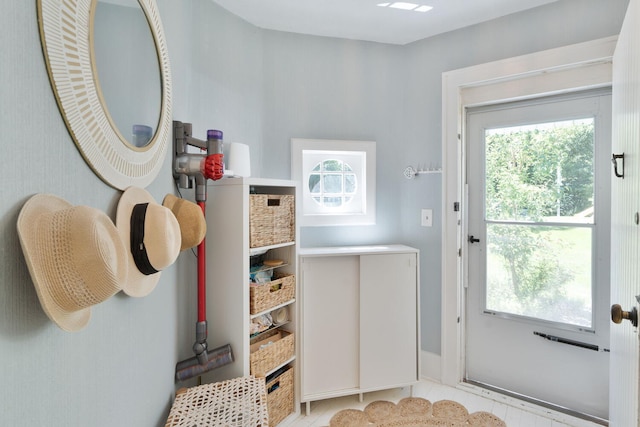 61412 Walnut St, Cassopolis, MI 49031 - doorway with baseboards, tile patterned flooring, and a wealth of natural light