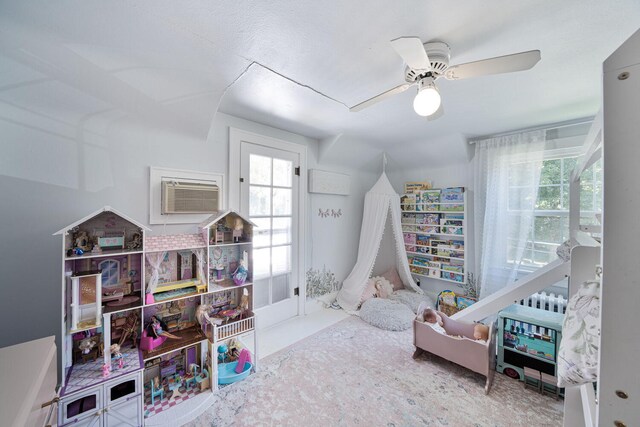 61412 Walnut St, Cassopolis, MI 49031 - game room featuring plenty of natural light, ceiling fan, and a wall unit AC
