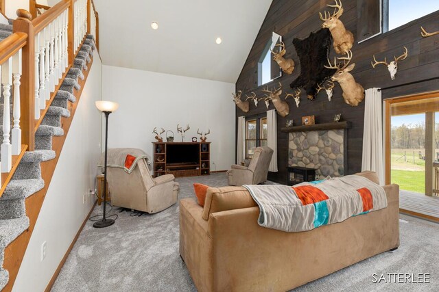 living room featuring stairway, high vaulted ceiling, carpet flooring, and recessed lighting
