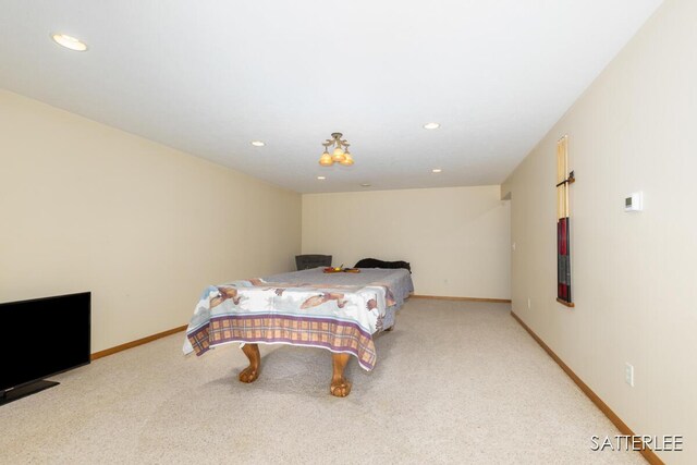 bedroom featuring recessed lighting, carpet flooring, and baseboards