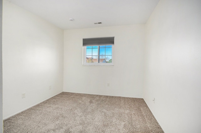 420 Baldwin Ave Unit 92, Rochester, MI 48307 - carpeted empty room with baseboards and visible vents