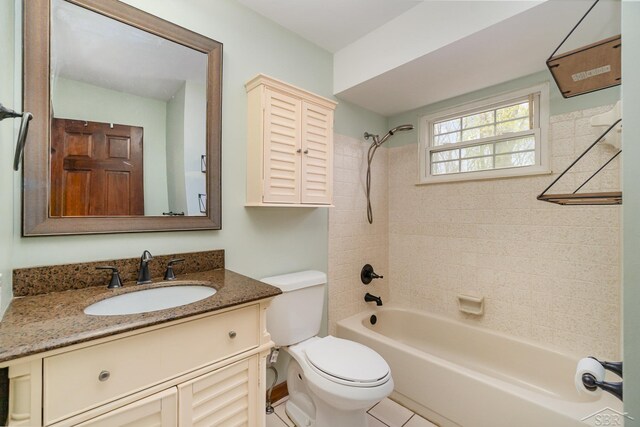 full bathroom featuring toilet, tub / shower combination, and vanity