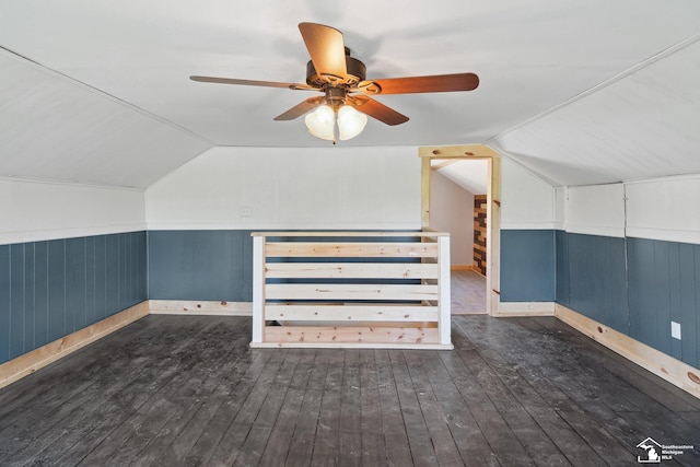 13280 Burt Rd, Pittsford, MI 49271 - additional living space featuring baseboards, wood-type flooring, a ceiling fan, and lofted ceiling