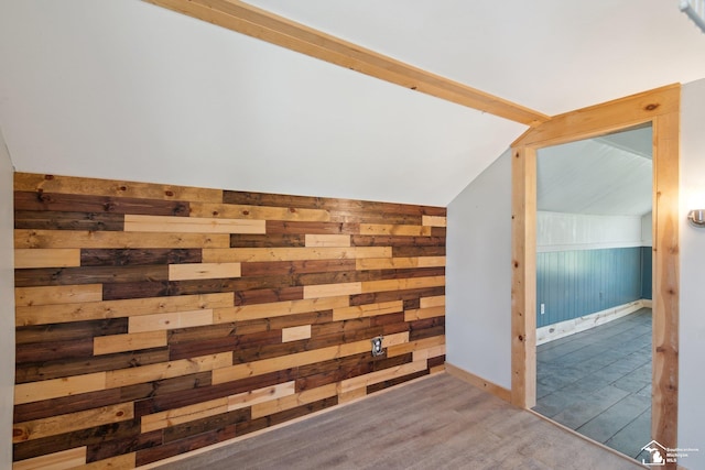13280 Burt Rd, Pittsford, MI 49271 - bonus room featuring wooden walls, baseboards, wood finished floors, and lofted ceiling