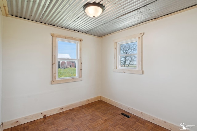 13280 Burt Rd, Pittsford, MI 49271 - spare room featuring baseboards and visible vents