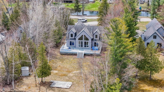 7734 N Shore Ct, Grawn, MI 49637 - drone / aerial view featuring a water view