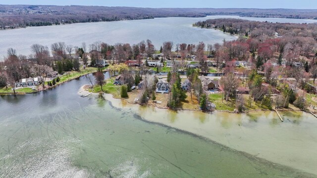 7734 N Shore Ct, Grawn, MI 49637 - bird's eye view featuring a water view and a residential view