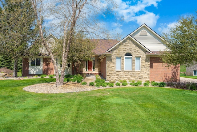 view of front of house featuring a front yard and stone siding