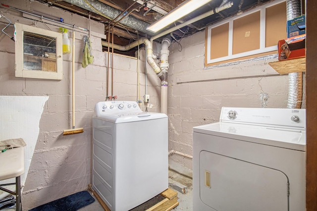 laundry area with laundry area and independent washer and dryer