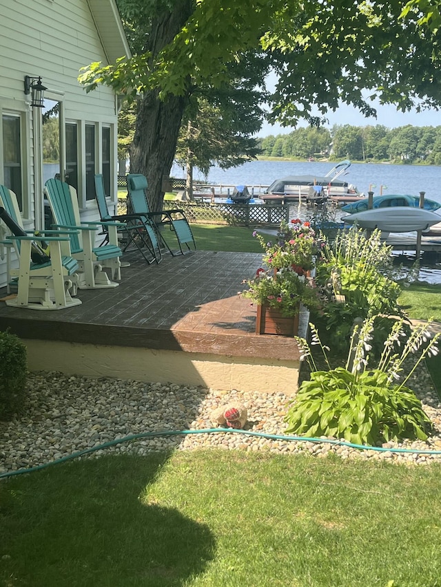 wooden terrace with a water view