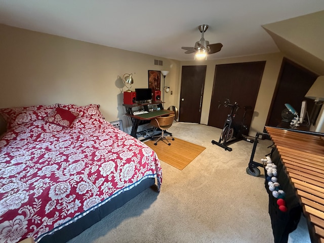 55535 Woody Ln, South Lyon, MI 48178 - bedroom featuring carpet flooring, ceiling fan, and multiple closets