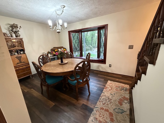 55535 Woody Ln, South Lyon, MI 48178 - dining area with a chandelier, a textured ceiling, dark wood-type flooring, stairway, and baseboards