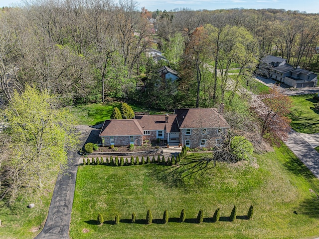 aerial view featuring a view of trees