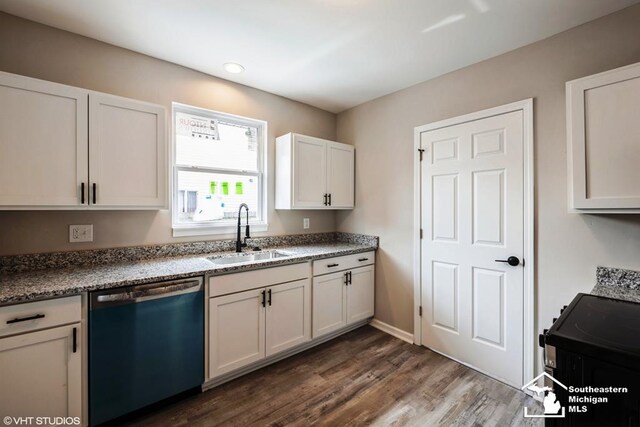 kitchen with dark wood-style flooring, white cabinetry, a sink, stone counters, and dishwasher