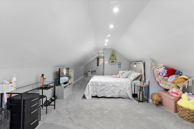 carpeted bedroom featuring lofted ceiling
