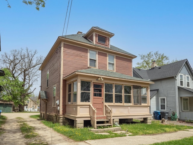 734 Mccourtie St, Kalamazoo, MI 49008 - view of front of house featuring entry steps and roof with shingles