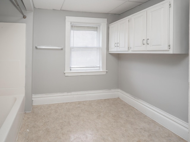 734 Mccourtie St, Kalamazoo, MI 49008 - clothes washing area with baseboards and carpet
