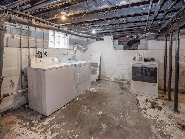 below grade area featuring washing machine and dryer