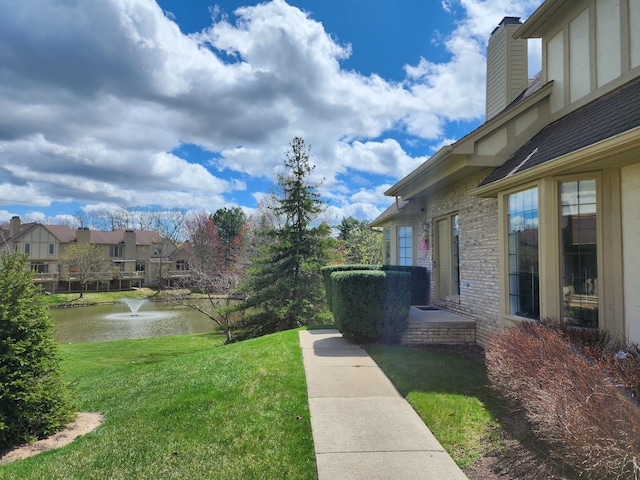 view of yard with a water view