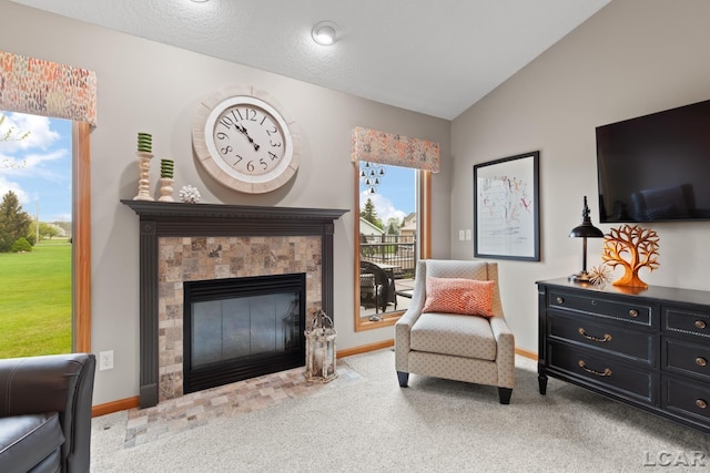 3136 Planeview Dr, Adrian, MI 49221 - sitting room with a fireplace with flush hearth, baseboards, carpet, and lofted ceiling