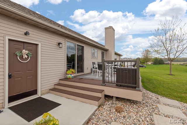3136 Planeview Dr, Adrian, MI 49221 - deck with outdoor dining area and a yard