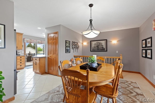 3136 Planeview Dr, Adrian, MI 49221 - dining area featuring baseboards and light tile patterned floors