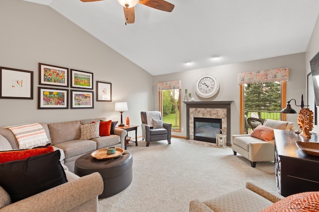 3136 Planeview Dr, Adrian, MI 49221 - carpeted living room with a tiled fireplace, ceiling fan, and lofted ceiling
