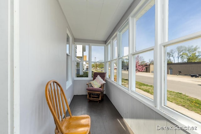 sunroom with hardwood / wood-style flooring